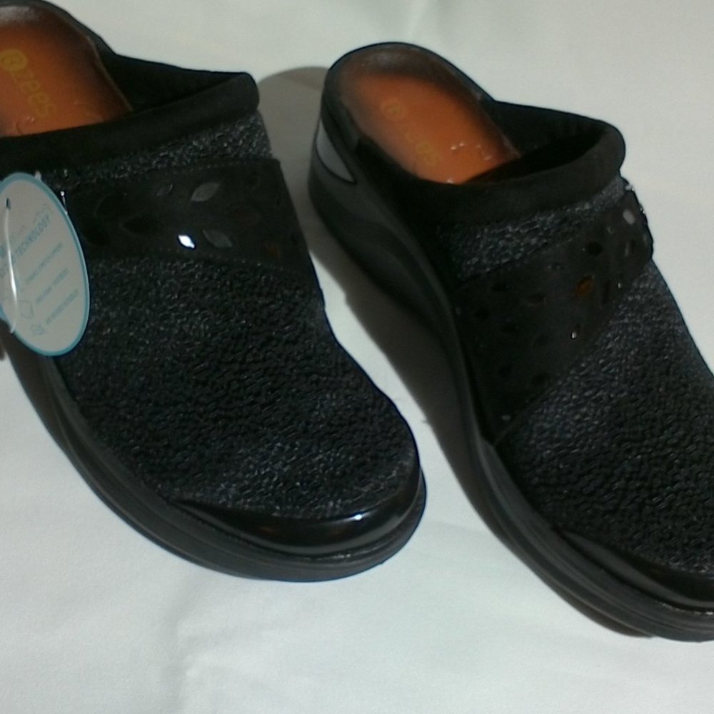 Bzees black clogs - machine wash and air dry.